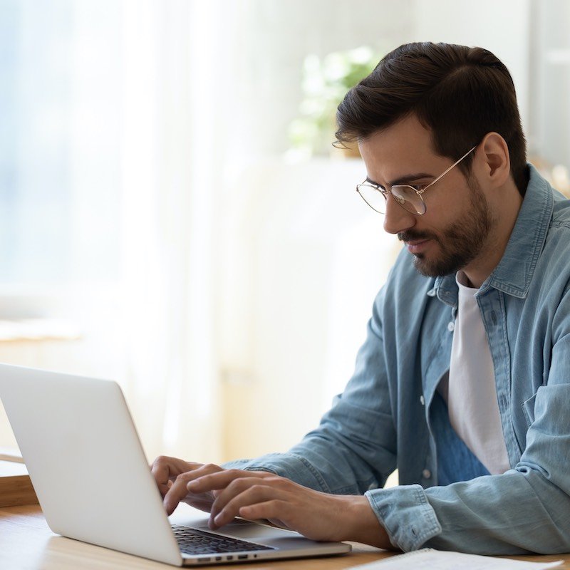 Man Using His Laptop, Digital Nomad Concept