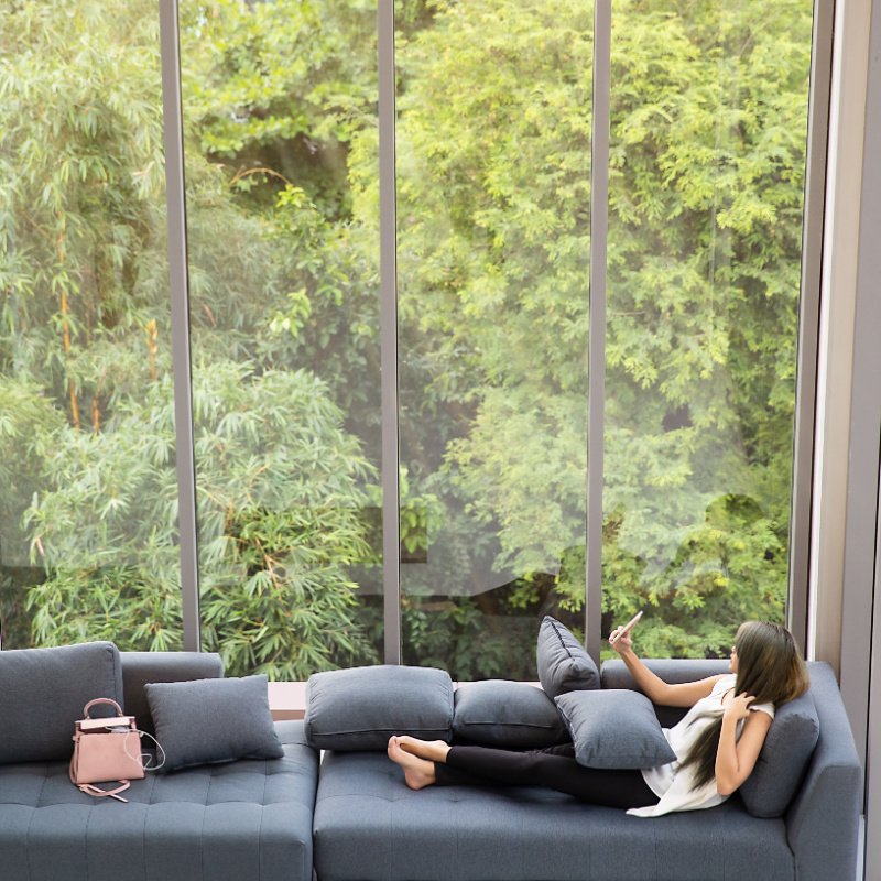 Woman sitting on Couch