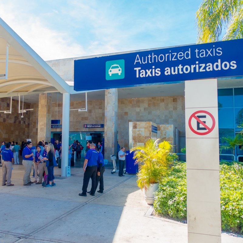 Sign for airport taxis in cancun