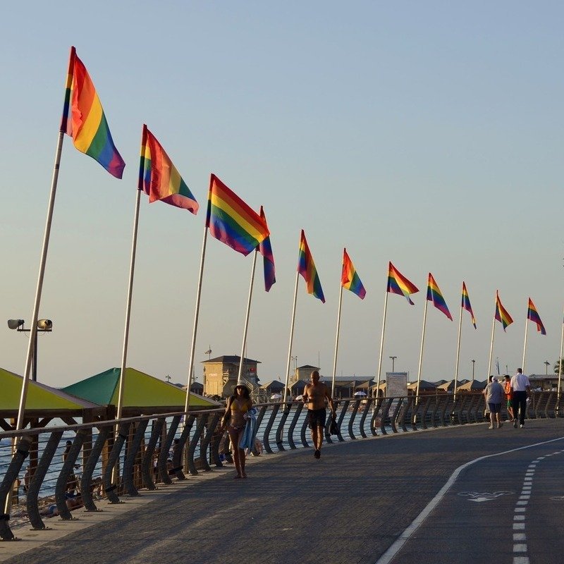 Rainbow LGBTQ Flags Displayed On A Seafront Promenade In Tel Aviv, Israel