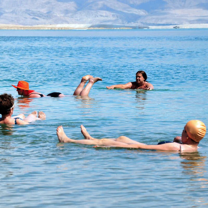 People Floating In The Dead Sea, Israel, Middle East