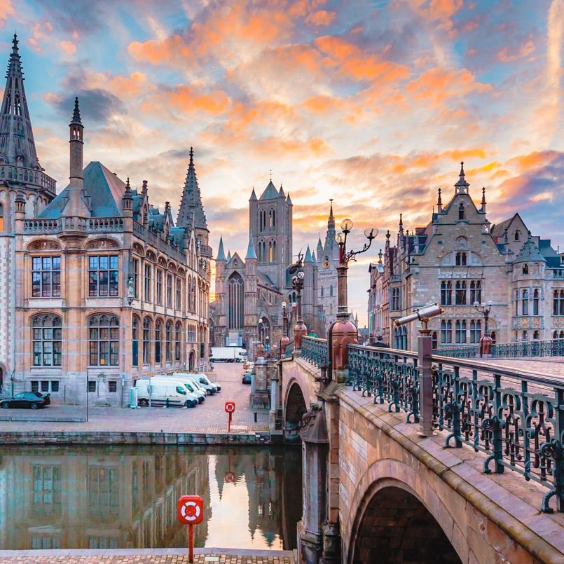 Ghent Belgium bridge with sunset in the background