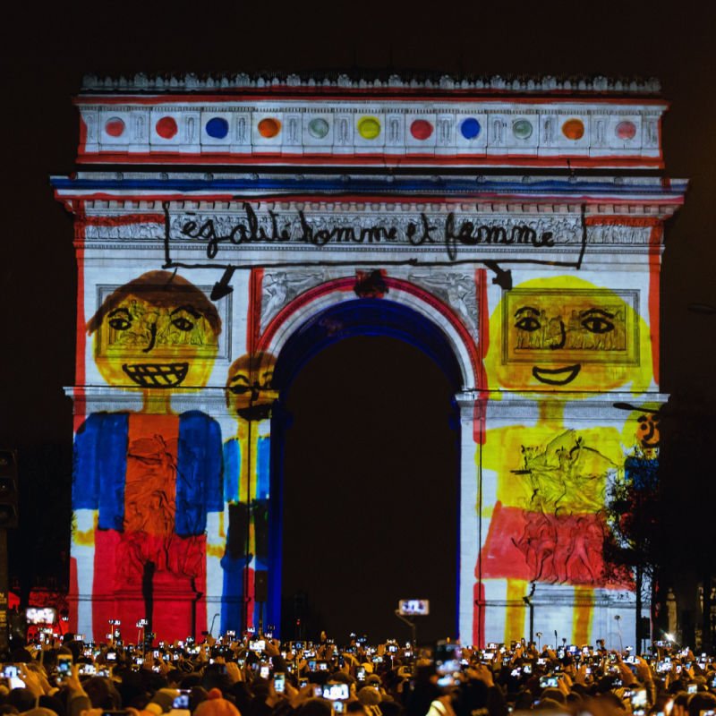 Light show on the Arc de Triomphe on the Champs Elysees