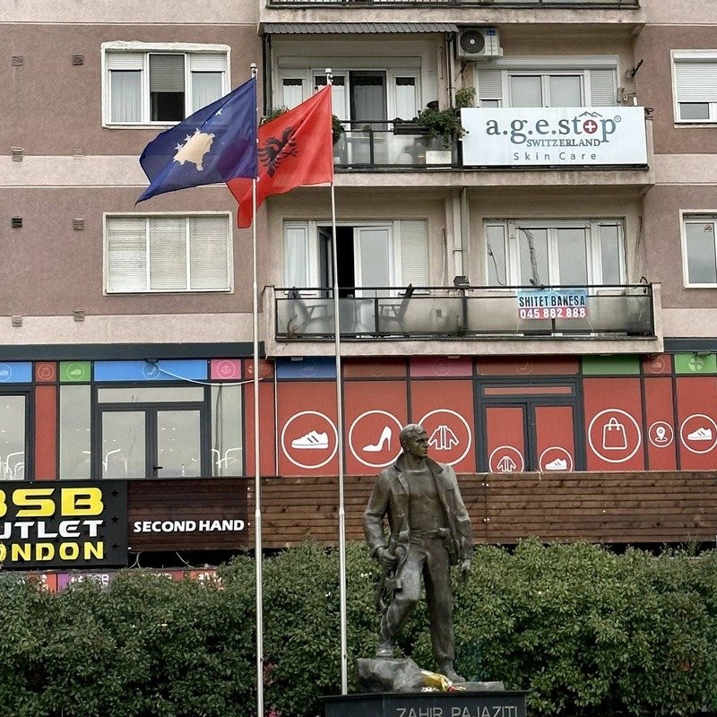 Kosovo And Albania's Flags Flying Side By Side In A Public Square In Pristina, Kosovo, Eastern Europe