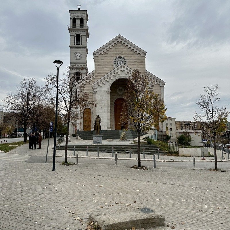 Whitewashed Facade Of Nene Tereza Cathedral In Pristina, Kosovo