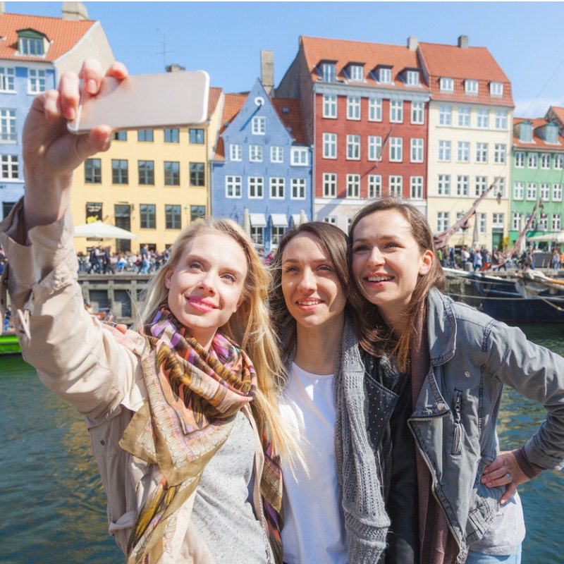 A group of women take a selfie in Amsterdam