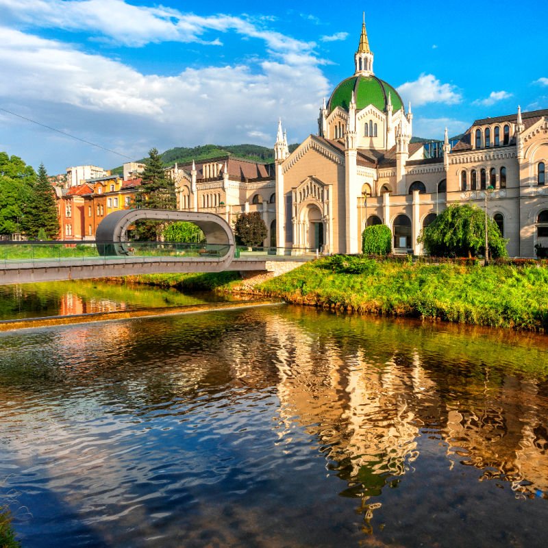 sarajevo, a stream runs in front of a historic building