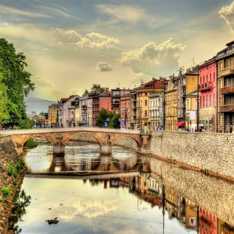 sarajevo bridge with people walking over 