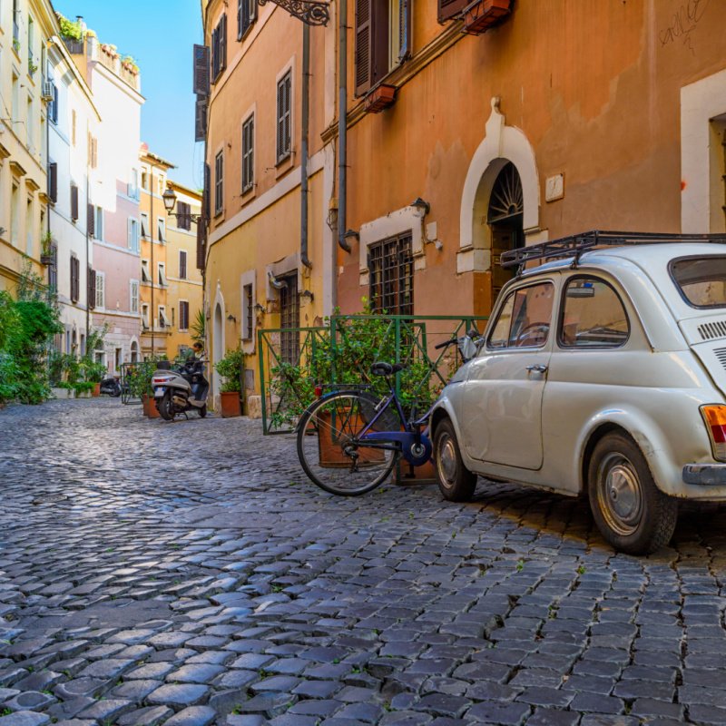 Cozy old street in Trastevere in Rome, Italy. Trastevere is rione of Rome, on the west bank of the Tiber in Rome, Lazio, Italy. Architecture and landmark of Rome.