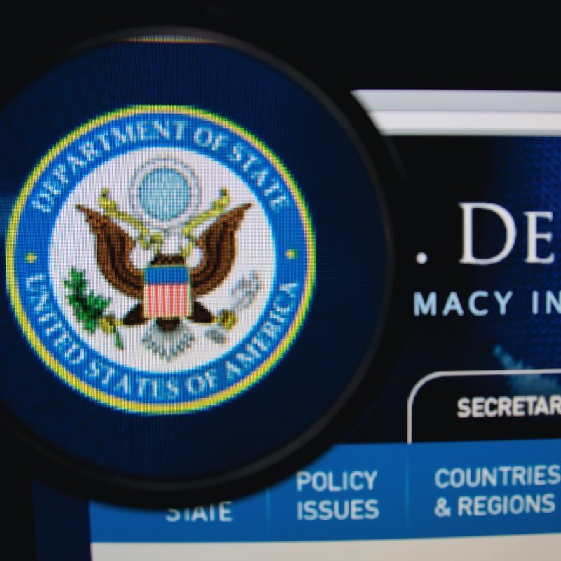 U.S. State Department logo on computer screen