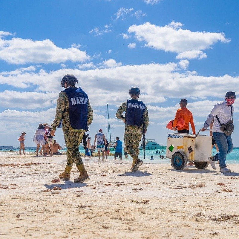 Police Patrolling The Beach In Isla Mujeres, Mexican Caribbean, Latin America