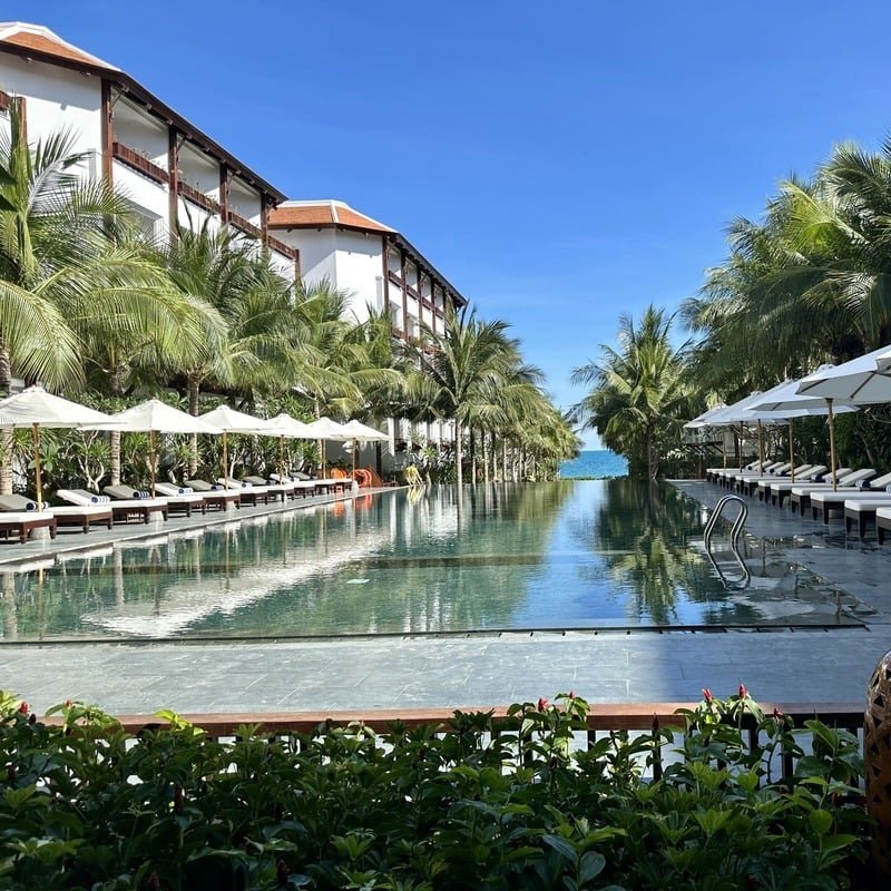 Infinity Pool Cascading Down To The Beach In The Anam Mui Ne, Mui Ne Province, Southern Vietnam, Southeast Asia