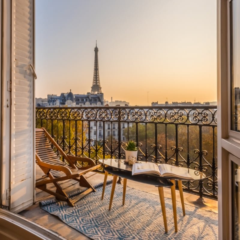 paris balcony with splendid view on eiffel tower at sunset