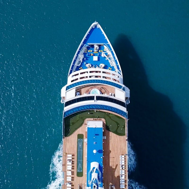 cruise ship from above blue water