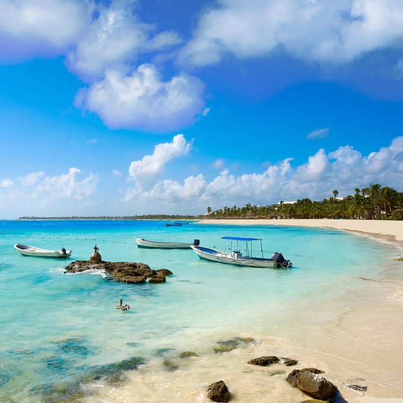 Fishiing Boats Docked By A Sandy Beach In Akumal, On The Mayan Riviera, Caribberan Sea, Mexico