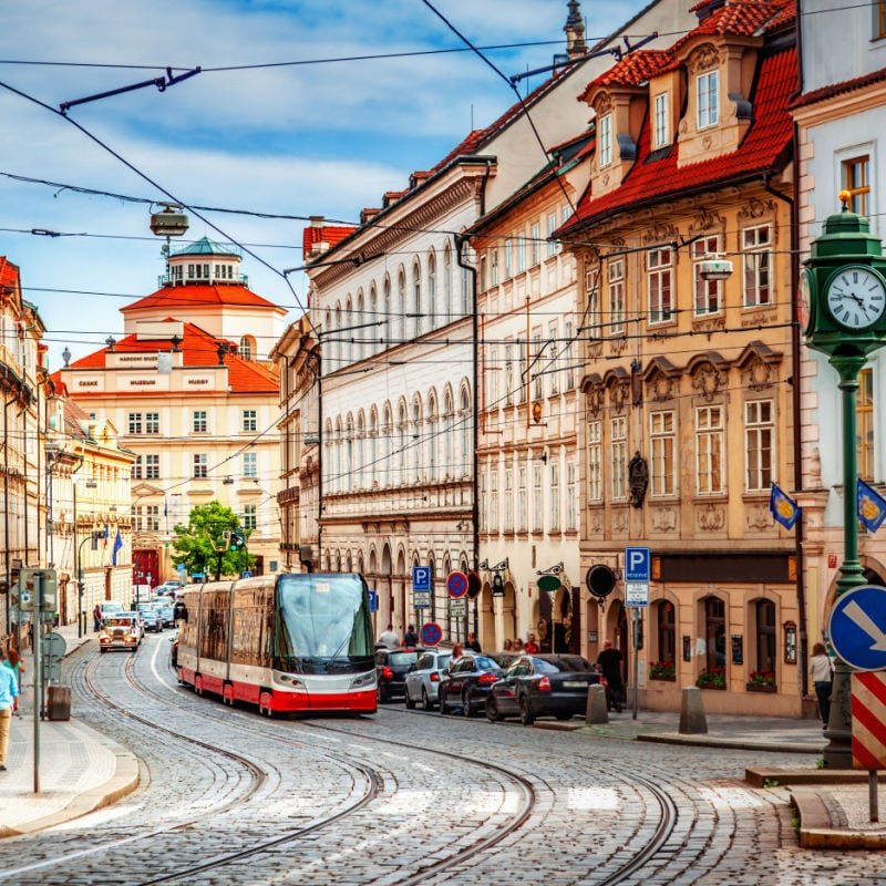 A tram winds through the streets of Prague