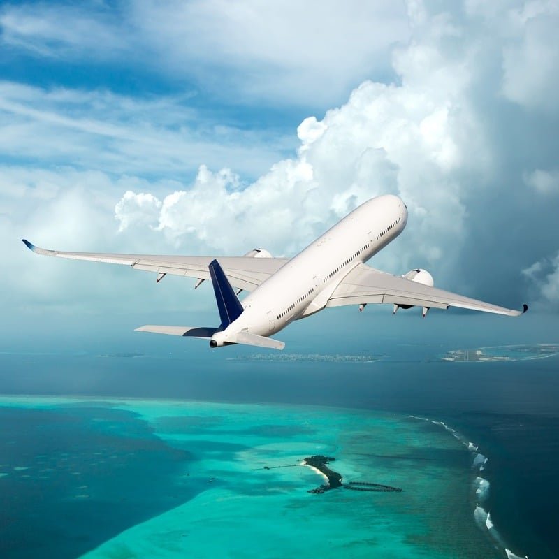 Plane Flying Over The Caribbean, Caribbean Travel