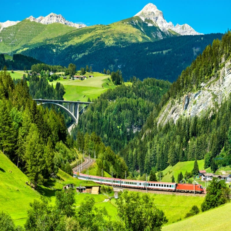 Passenger train at the Brenner Railway in the Austrian Alps