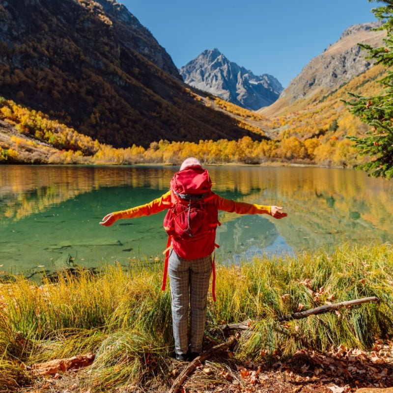 happy woman in fall scenery, Austria