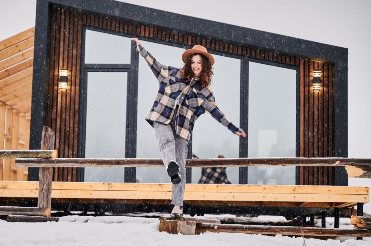 woman playing in the snow