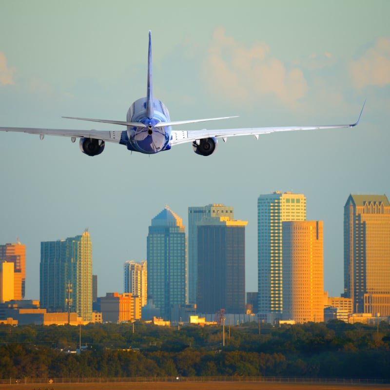 Plane near Tampa skyline