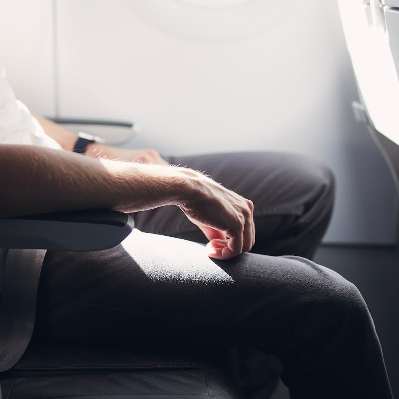 Man Sitting On Plane, Unspecified Location