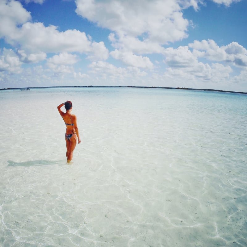 Tourist In Clear Water Of Bacalar, Mexico