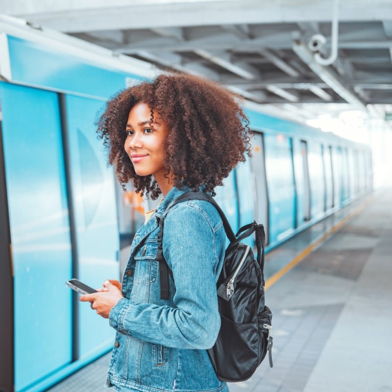 Happy Traveler Walking Into A Train, Unspecified Location